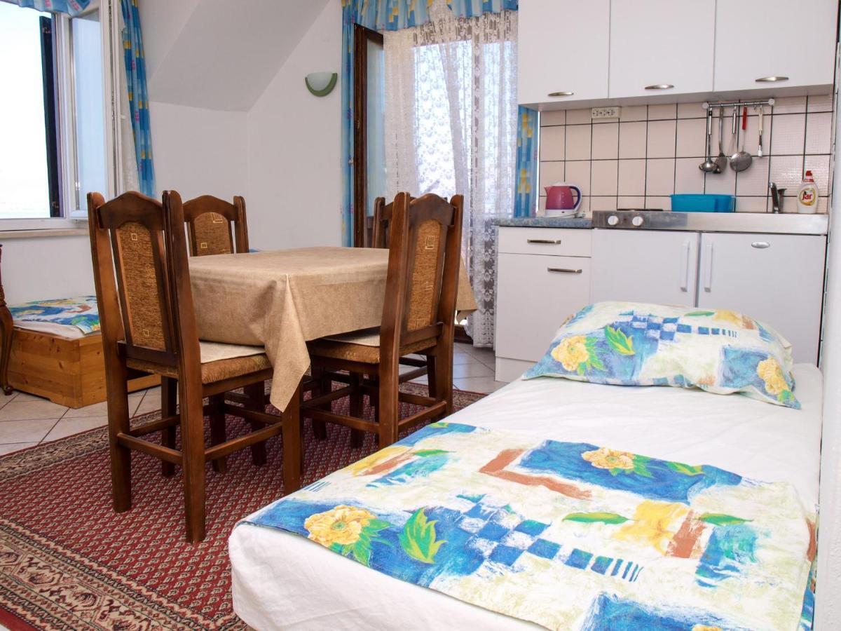 Apartments Vukovic Postira Pokoj fotografie